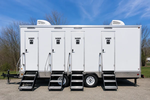 Mobile shower trailer with private shower stations