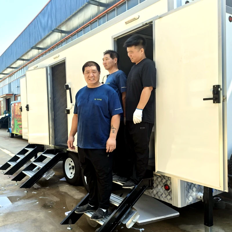 Finished restroom trailers undergoing pre-shipment inspection