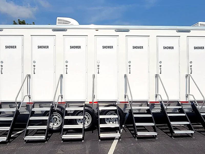 8 stall mobile shower trailer with multiple private shower entrances, individual steps, and high-capacity layout for workforce camps and emergency hygiene support.