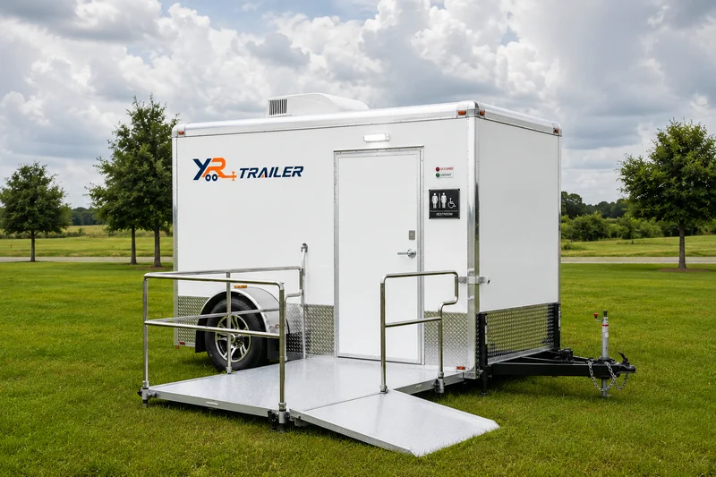 Hydraulic lowering chassis option for ADA accessible restroom trailer entry design.